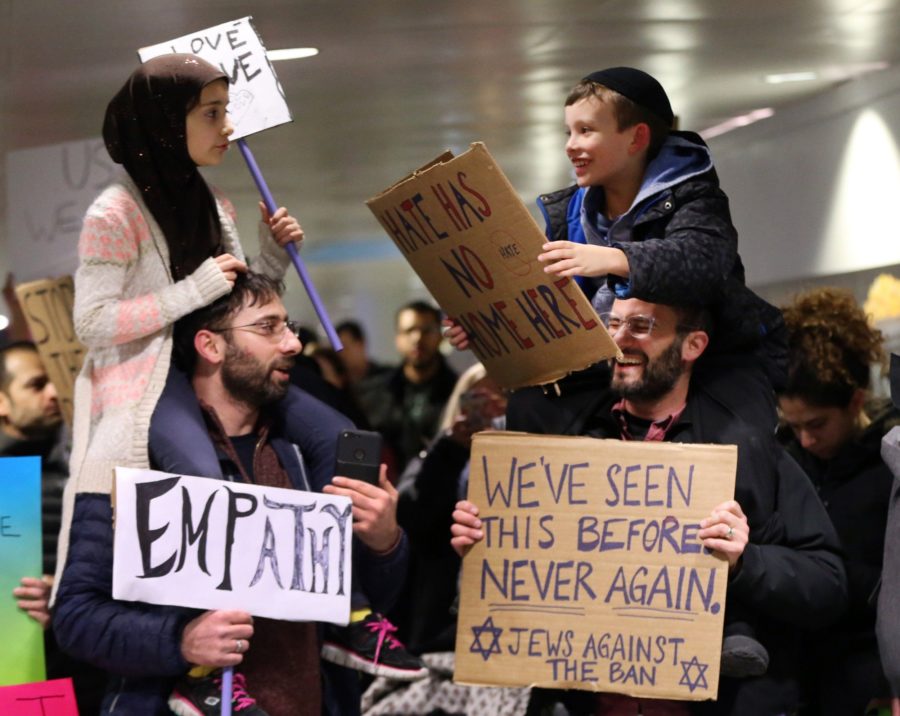 This Touching Picture at a Travel Ban Protest has Warmed the Hearts of Many Americans