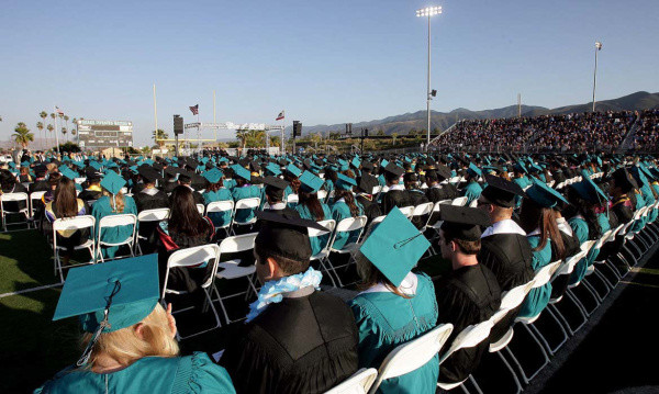 Graduates from Santiago High School take their seats during their graduation ceremony at Santiago High School in Corona Ca. May.30, 2012.