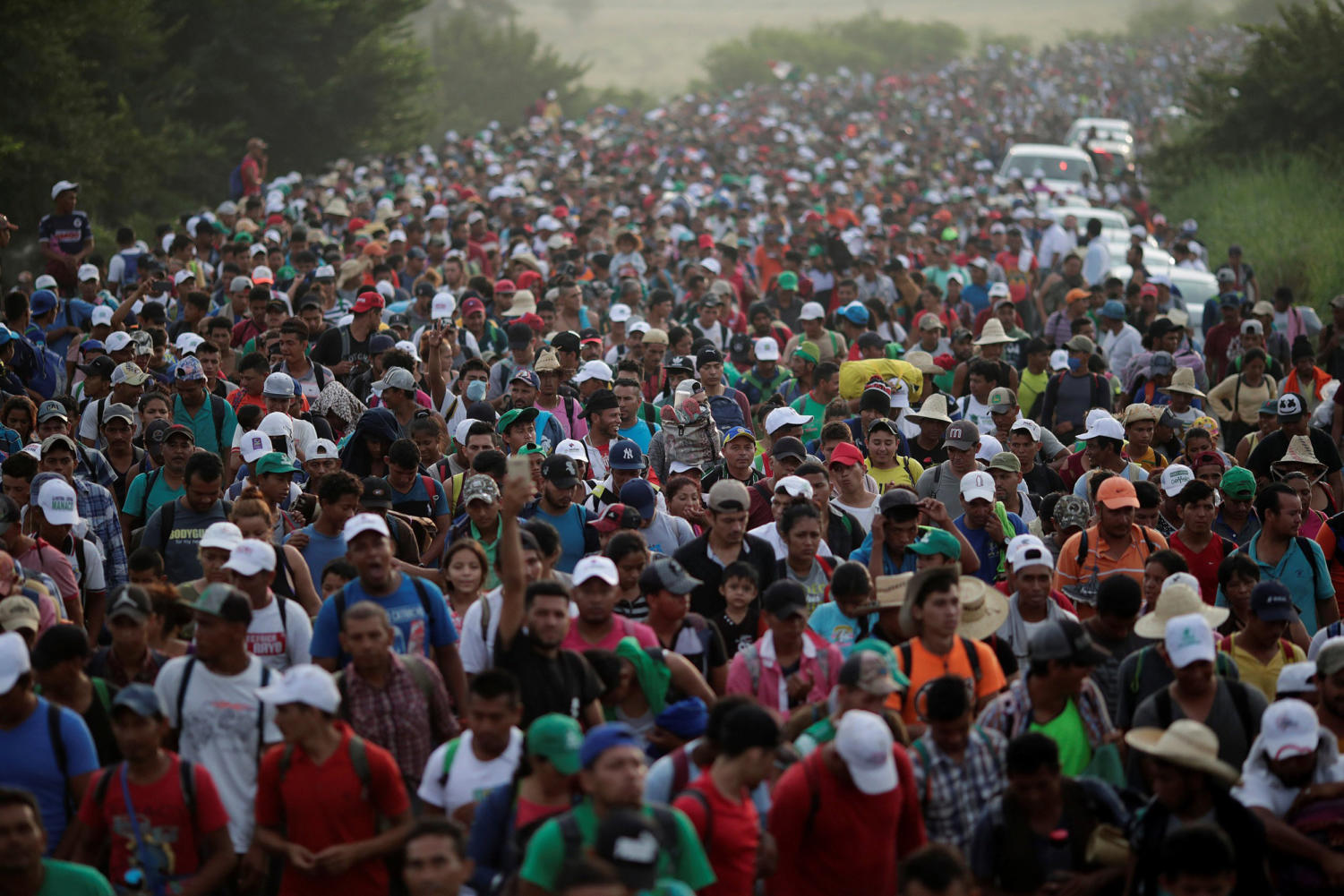 A caravan of thousands of migrants from Central America, en route to the United States, makes its way to San Pedro Tapanatepec from Arriaga, Mexico on Oct. 27, 2018.