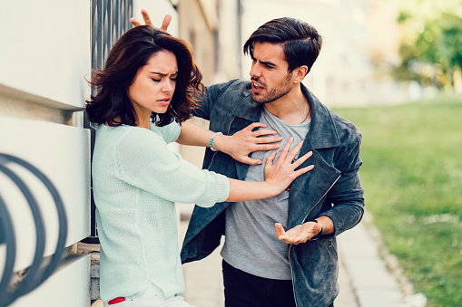 Annoyed boyfriend arguing with his girlfriend